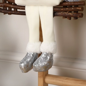 Poupée de Noël à suspendre avec jambes en peluche blanche et bottes à paillettes argentées