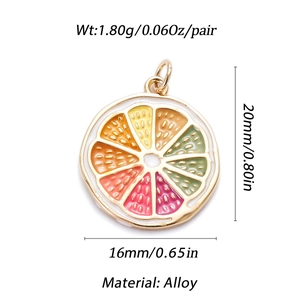 Detailed macro view of an enamel orange slice pendant with alloy frame and gold finish