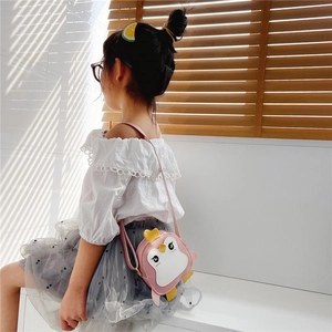 Pink penguin cartoon crossbody bag for kids with zip closure and faux leather strap