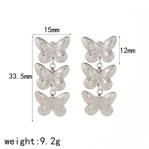 Minimalist triple butterfly drop earrings in stainless steel with textured finish details