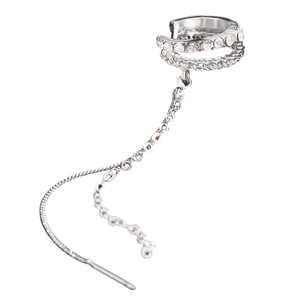 Detail of silver long tassel ear cuff featuring sparkling white rhinestones and chain texture