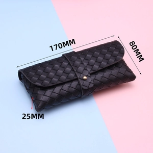 Detail showing 170x80x25mm dimensions of black woven faux leather sunglasses case