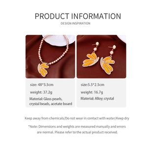 Detailed size and material information for vintage butterfly pearl jewelry set