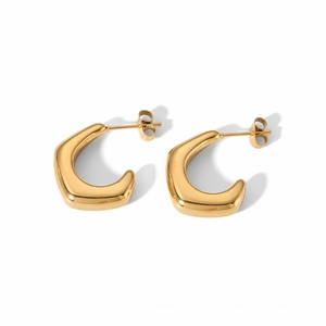 Detailed view of glossy 18K gold-plated stainless steel C-shaped earrings on white background