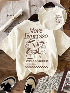 Cream cotton T-shirt with cartoon coffee print and More Espresso text on wood background