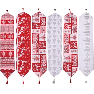 Christmas jacquard knit table runners featuring reindeer and snowflake patterns with tassels