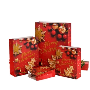 Extra large Christmas gift bags with gold foil and glitter snowflake patterns