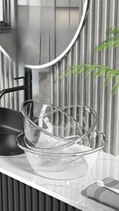 Close-up of thick transparent PET washbasins in large and small sizes for bathroom use