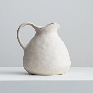Matte beige ceramic teapot vase with irregular textures for European home table decor
