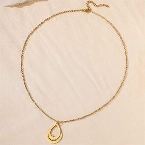 Detail view of double-layered 18k gold waterdrop pendant with fine o-link chain adjustable