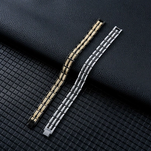 Men's titanium steel magnetic therapy wheat link bracelet in silver and gold-black tones