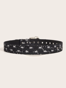 Detail of black denim belt featuring silver sequins and distressed vintage holes