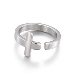 Adjustable silver stainless steel open ring with vintage cross design on white background