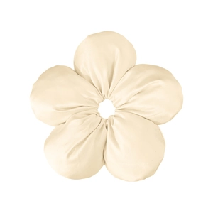 Macro detail of a beige satin flower scrunchie showing fabric texture and pleats