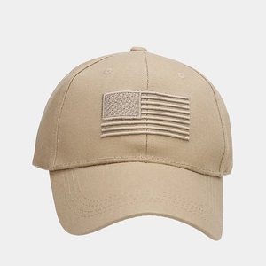 Detail of embroidered American flag on khaki cotton twill baseball cap with stitching