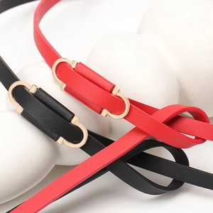 Thin red and black leather waist belts for women with adjustable gold slide buckles