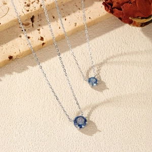 Elegant S925 sterling silver necklaces with blue rose cut crystal pendants on stone