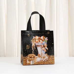 Black Christmas non-woven gift bag with festive sock and gold gift box printing