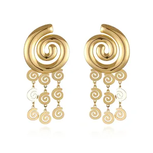 Detail view of large gold multi-layer spiral leaf fringe earrings with 18k plating