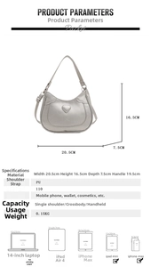 Silver PU leather crescent bag with heart embossing and size 20.5x16.5x7.5cm detail