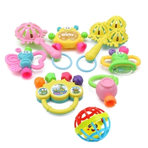Set of 8 colorful baby rattles including frog and butterfly shapes for sensory development