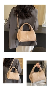Detailed views of beige leather cloud bag showing adjustable strap and handcrafted texture