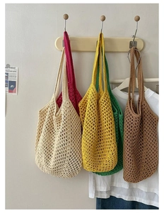 Detailed display of large cotton woven shoulder bags in five vibrant summer colors