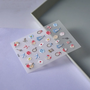 Detail of 5D embossed nail stickers featuring Alice theme roses and pocket watch