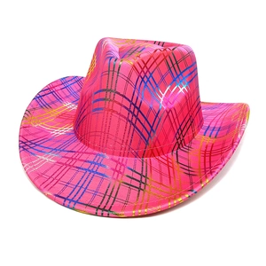 Close-up of pink metallic western cowboy hat with colorful grid pattern for festival parties