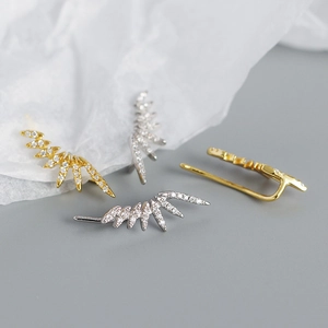 Luxurious S925 silver stud earrings featuring curved sparkling zircon wing design