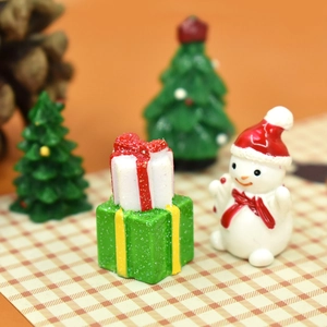 Miniature resin Christmas gift boxes with snowman and trees festive desktop decor