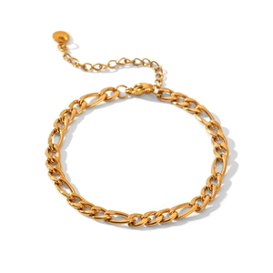 Close-up of 18K gold Figaro chain bracelet with lobster clasp and adjustable extension
