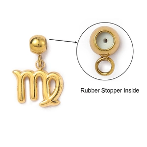 Macro detail of Virgo gold pendant with internal rubber stopper for positioning