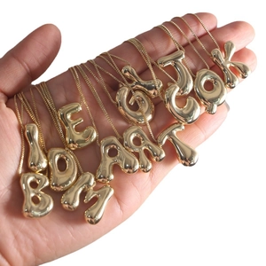 18K gold plated puffy bubble alphabet pendant necklace featuring 3D letters on box chain