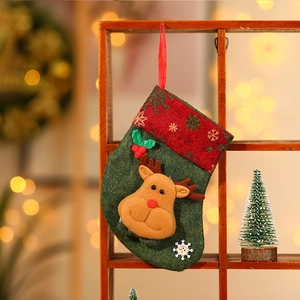 Christmas tree decoration stocking with 3D reindeer design on green and red felt