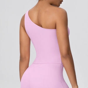 Detailed back view of one-shoulder yoga top in light purple stretch performance fabric