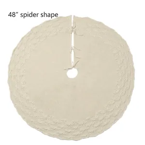48 inch cream white knit Christmas tree skirt with spider pattern and bow tie closure