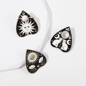 Three-piece gothic celestial enamel pins featuring sun moon and cat designs in black gold