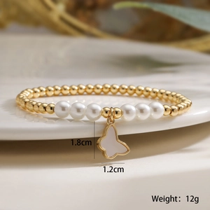 Detailed view of butterfly pendant with beads showing dimensions 1.8x1.2cm