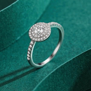 Elegant S925 sterling silver ring with double halo setting and round cut diamond simulant