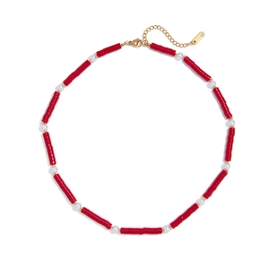 Elegant 18K gold stainless steel necklace with red and white beads in a circular layout