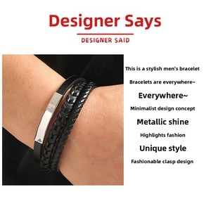 Detail view of multilayer black leather bracelet with silver metal plate and woven rope