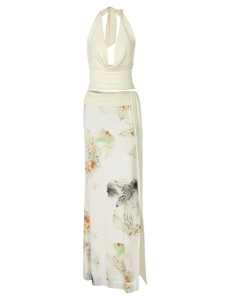 Women's two-piece floral set featuring a cream halter top and printed slit maxi skirt