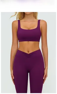 Detailed front view of deep purple brushed yoga bra with square neck and wide straps
