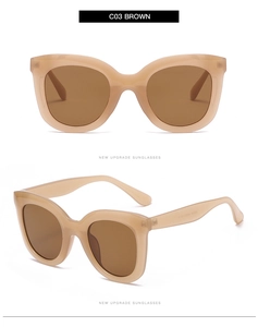 Detail view of C03 Brown oversized round cat-eye sunglasses with gradient brown lenses