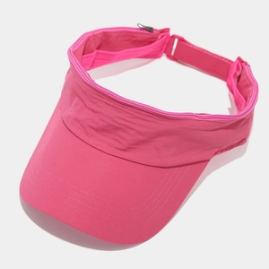 Detail of rose pink quick-dry visor cap featuring a secure side zipper pocket and stitching