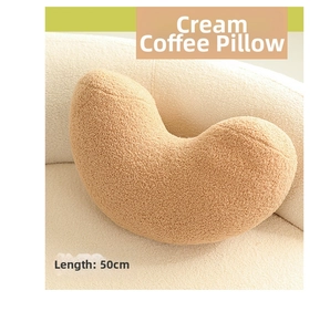 Detailed view of 50cm cashew-shaped cushion in light brown plush fleece fabric