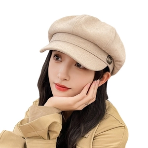 Classic beige wool octagonal newsboy hat for women styled in a versatile vintage look