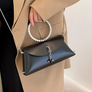 Chic black geometric handbag with rhinestone ring handle and silver chain strap for women