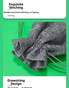 Detailed view of the neat stitching and drawstring closure on a purple linen bag